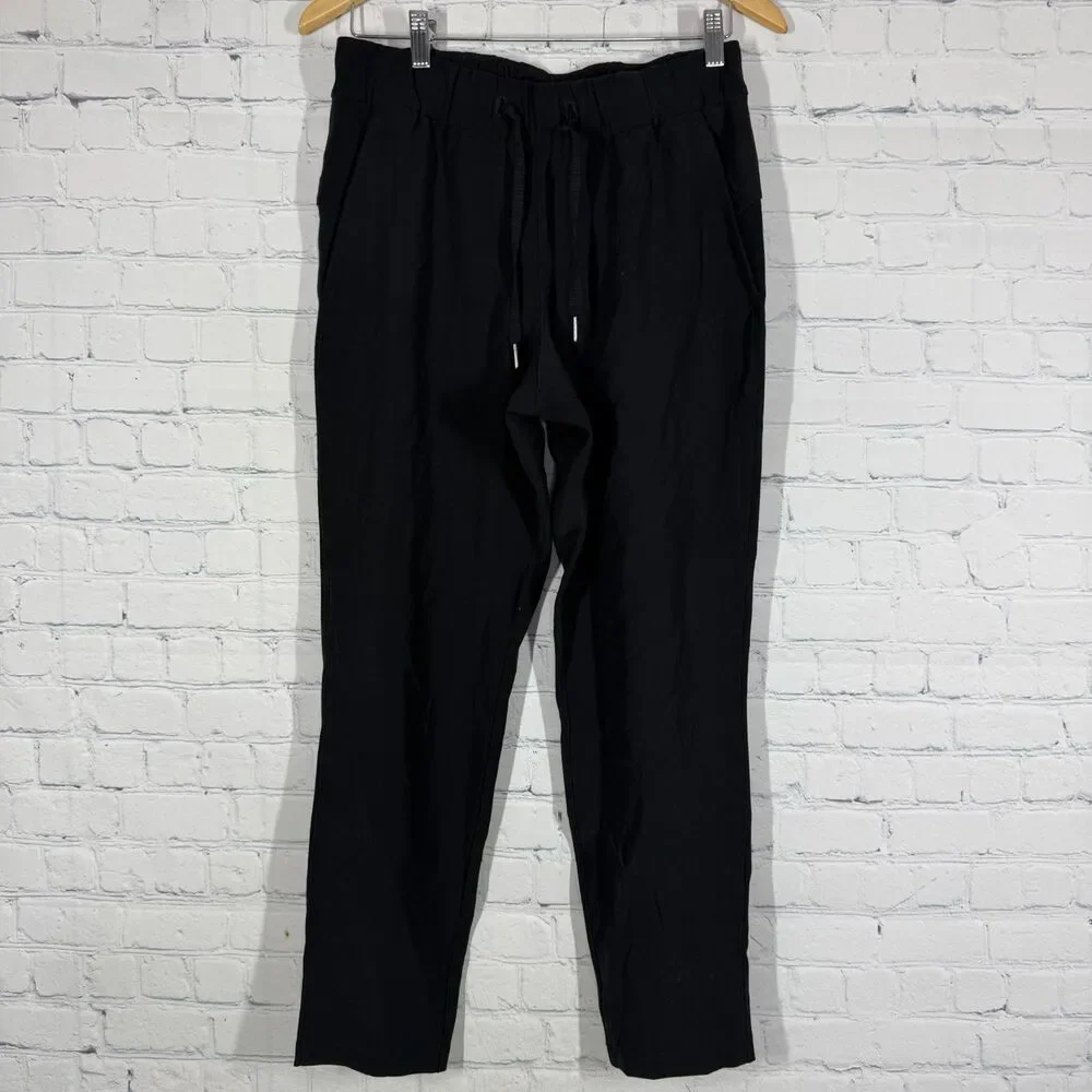 Lululemon On The Fly Pants Black Women's Size 6 Tapered Drawstring W5BPMS